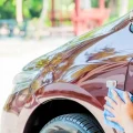 How Does Paintless Dent Removal Preserve Your Car’s Factory Finish?